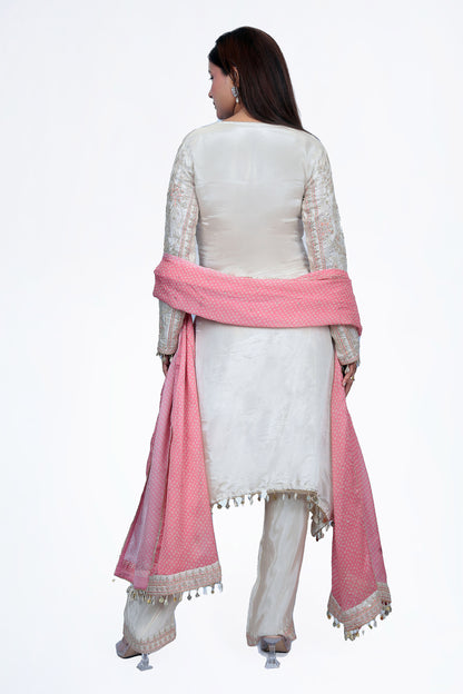 Cutdana and mirror work and the tassel with seashells enhances its uniqueness by giving a luxury look.