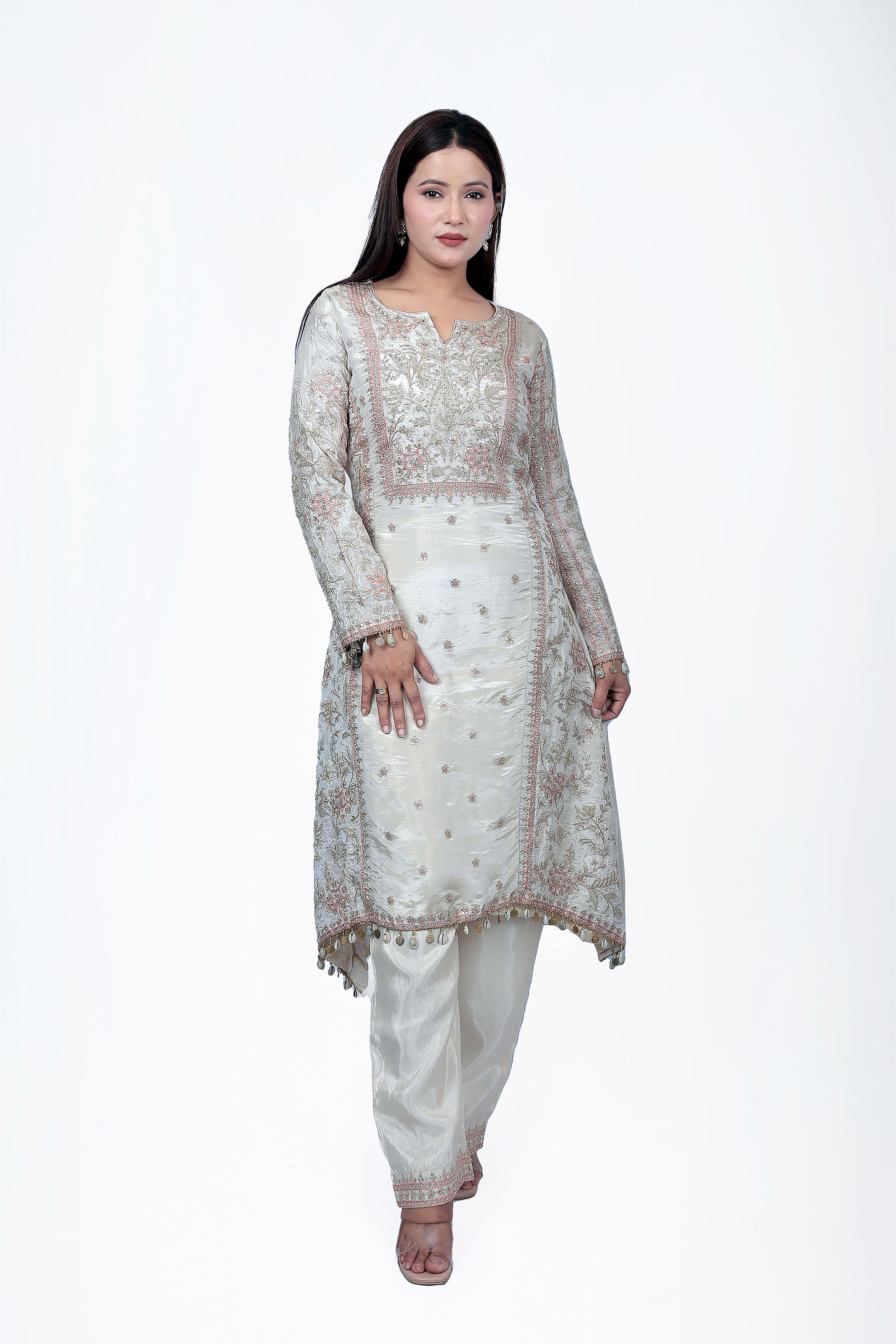 This kurta set is made out of pure silk fabric with zari work all over the seams and borders.