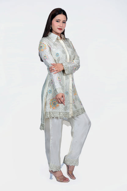 Handwoven fabric with shirt style top and bottom pants.