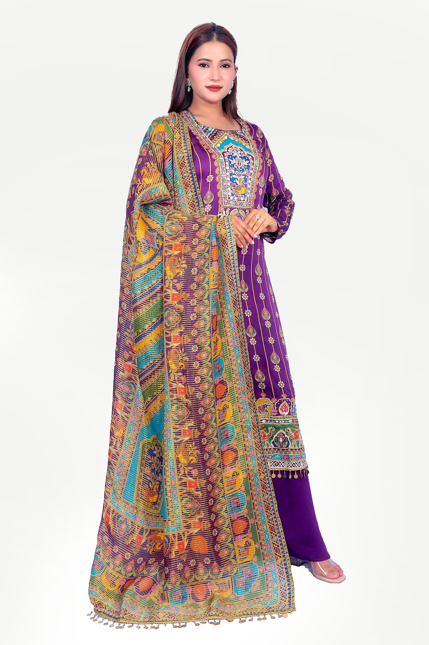 Indian traditional printed kurta set with embellishments.