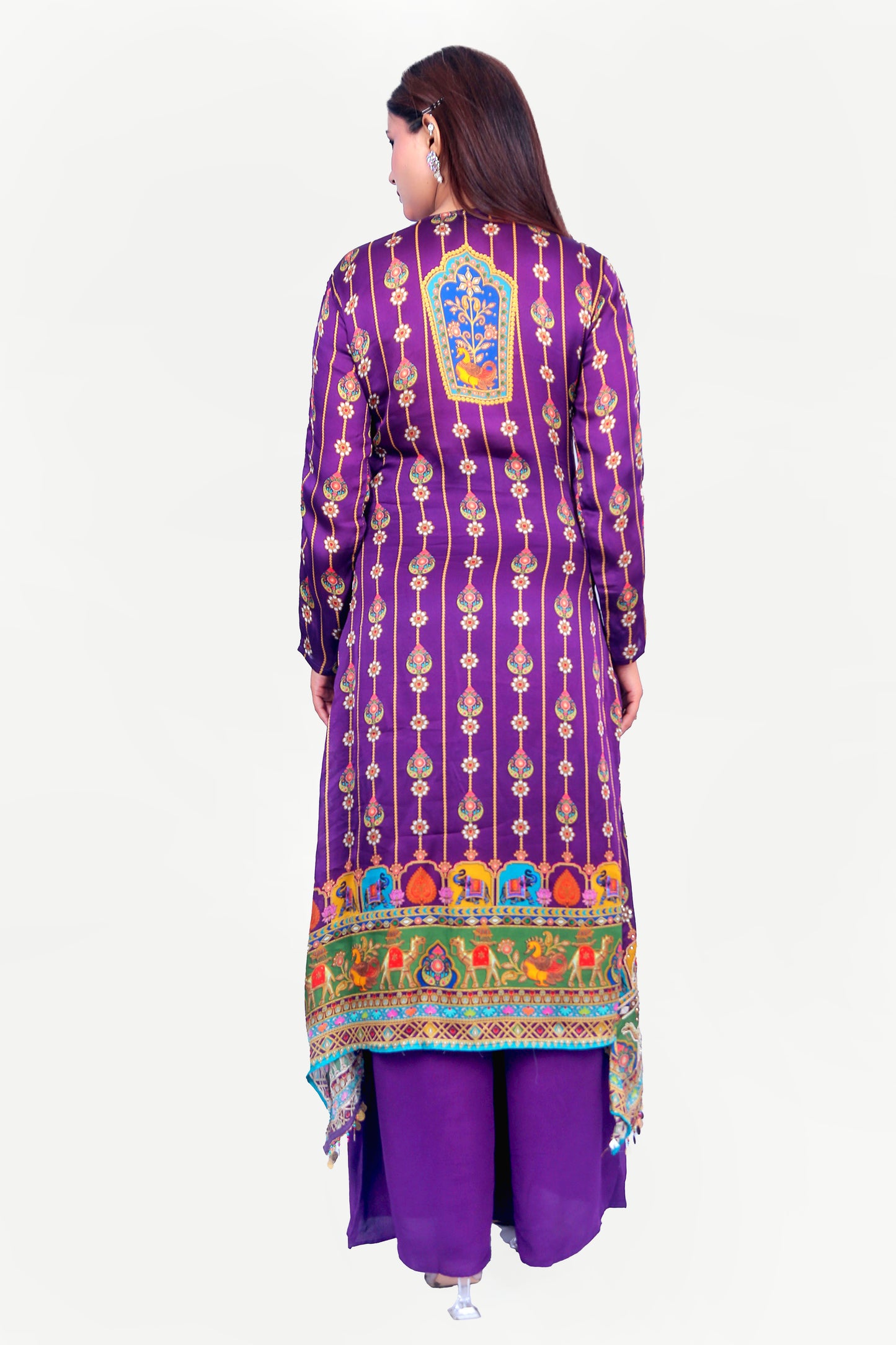 Indian traditional printed kurta set with embellishments.