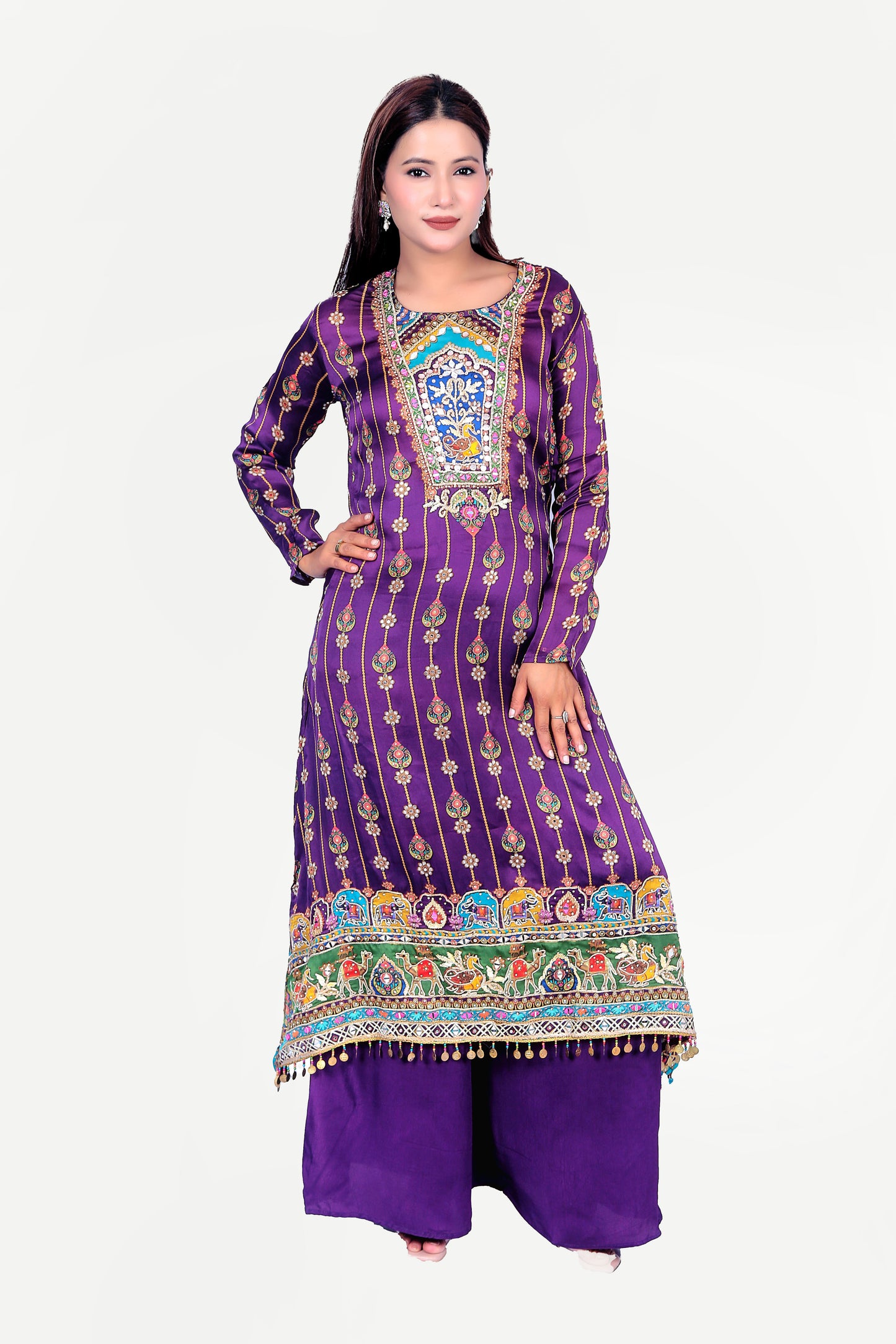 Indian traditional printed kurta set with embellishments.