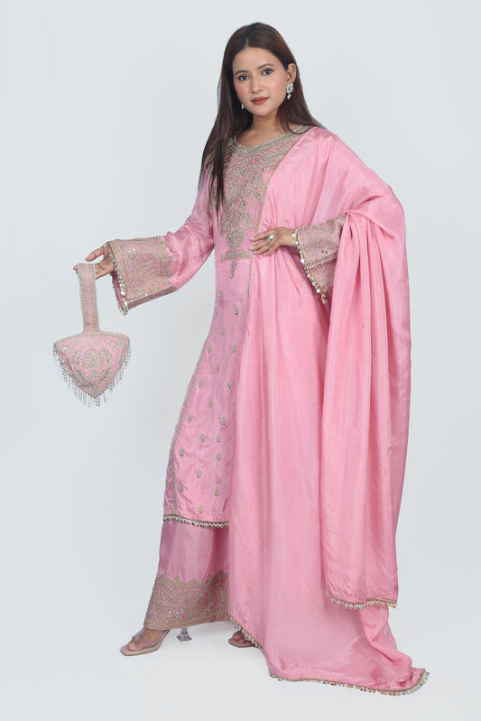 Embellished kurta set with matching potli bag for all wedding occasions.