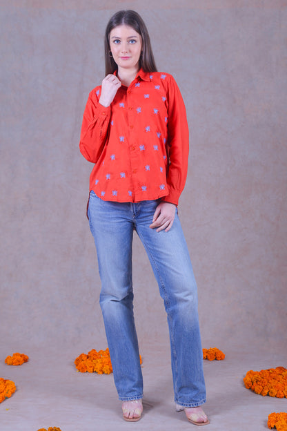 Stay stylised and comfortable in this cotton Chikankari orange shirt.