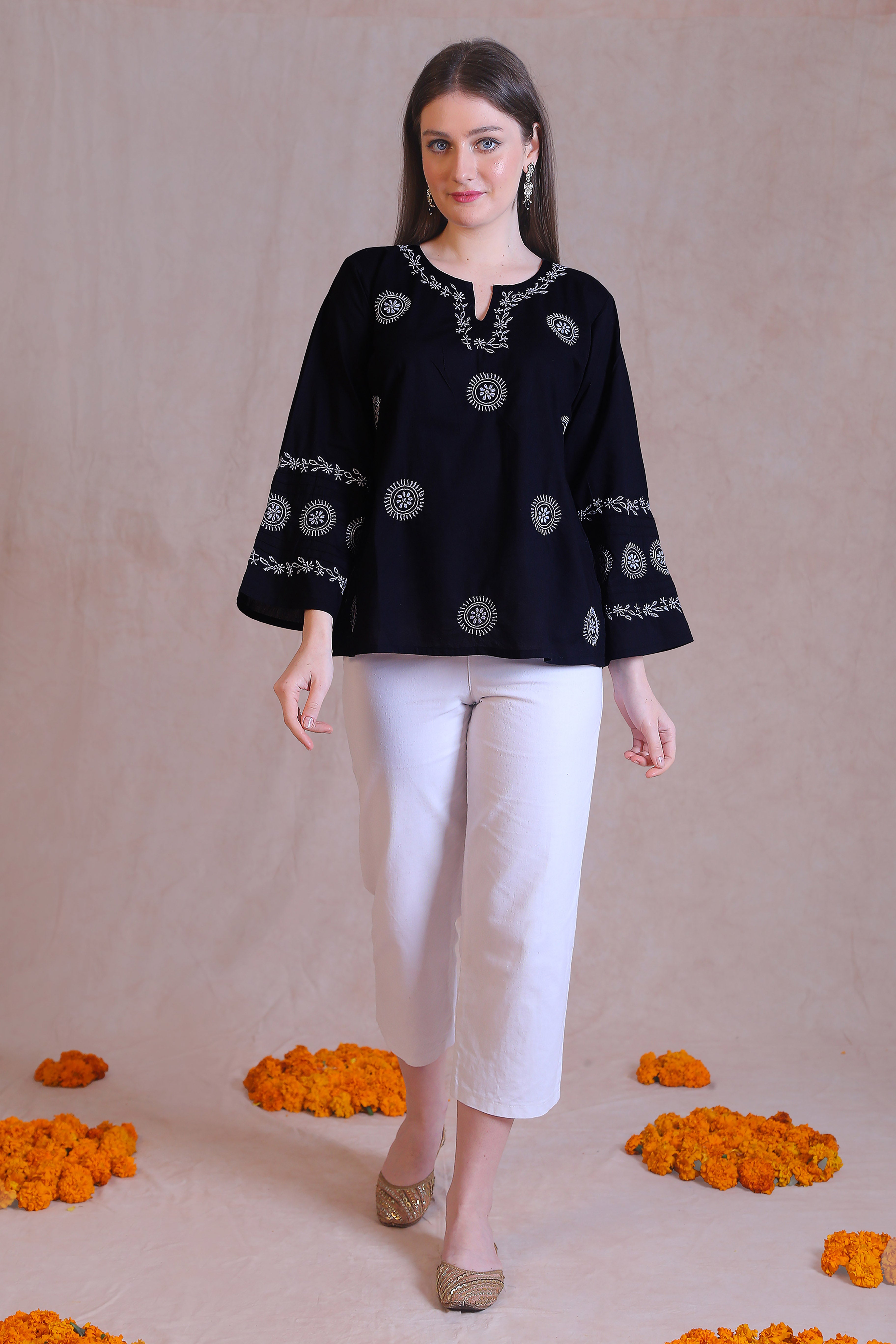 A chic outfit that goes well with Palazzo, Pants or even Denims.