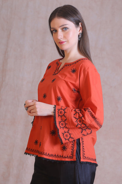 A chic outfit that goes well will Palazzo, Pants or even Denims.