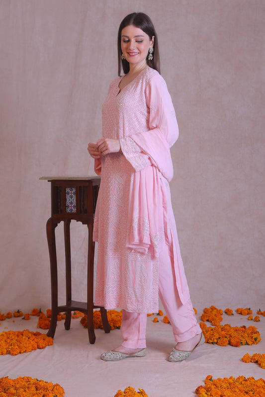 featuring intricate resham thread chikankari  and embellished with dainty cutdana, sequins and pote (little pearl). 