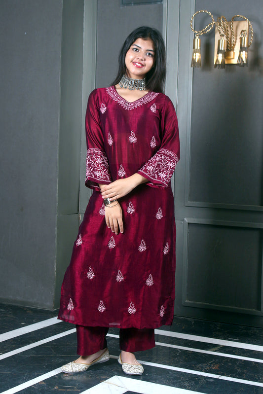 This Poly silk Chikankari kurta set offers a perfect blend of modern style and traditional charm. 