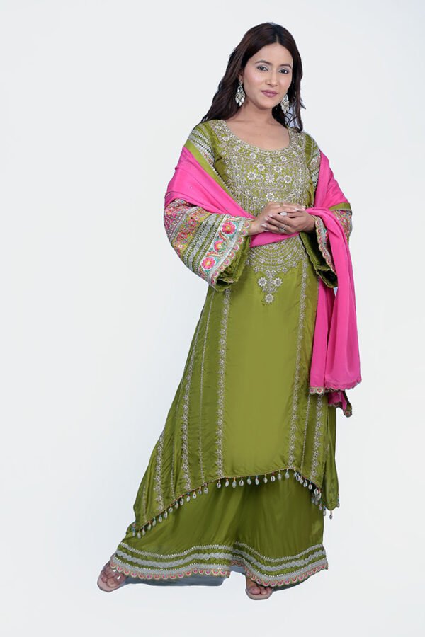 suit is crafted with premium silk fabric. heavily embroidered kurta set with palazzo.