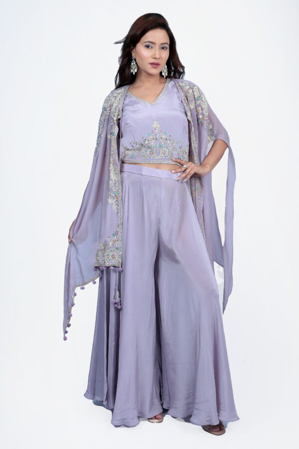 Lavender thread work top with sharara set. The palazzo pant and jacket set is designed with pure viscose fabric.