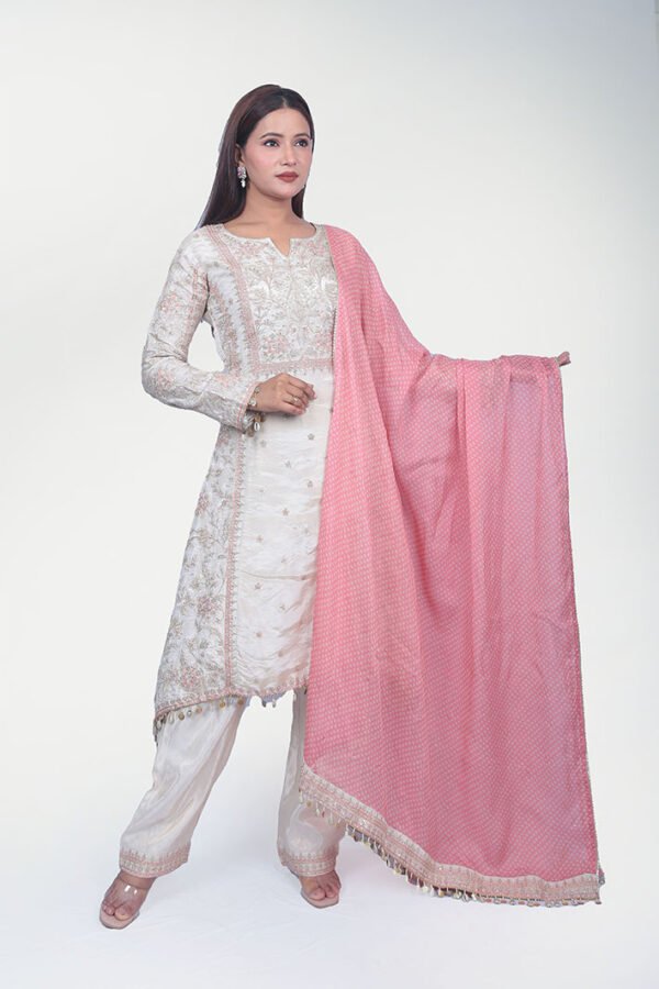 This kurta set is made out of pure silk fabric, Delicate zari work on the fabric.