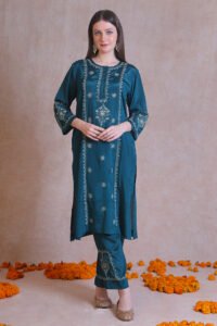 Green chikankari kurta with intricate hand-embroidered Chikankari motifs.